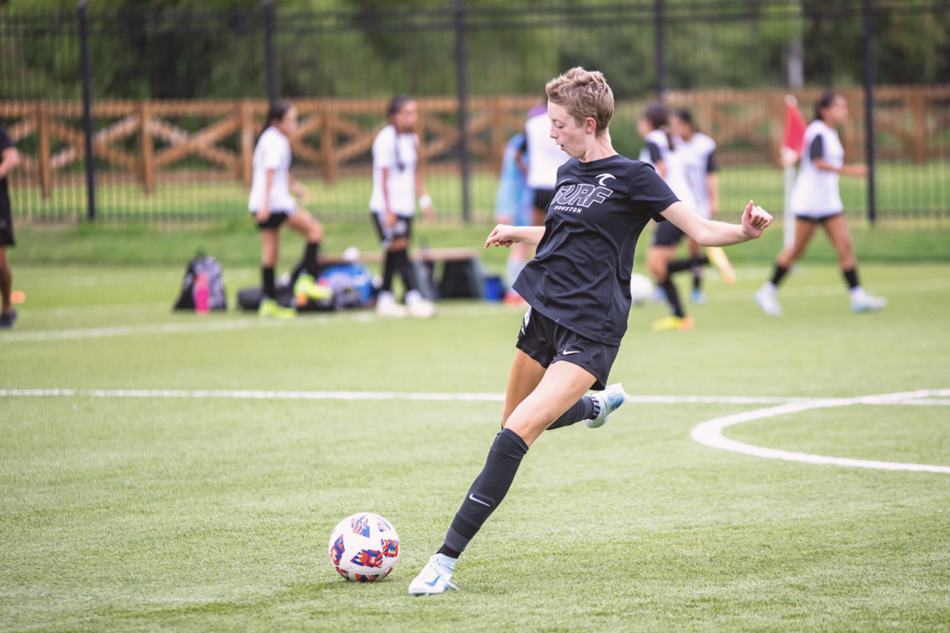 Brinn playing soccer